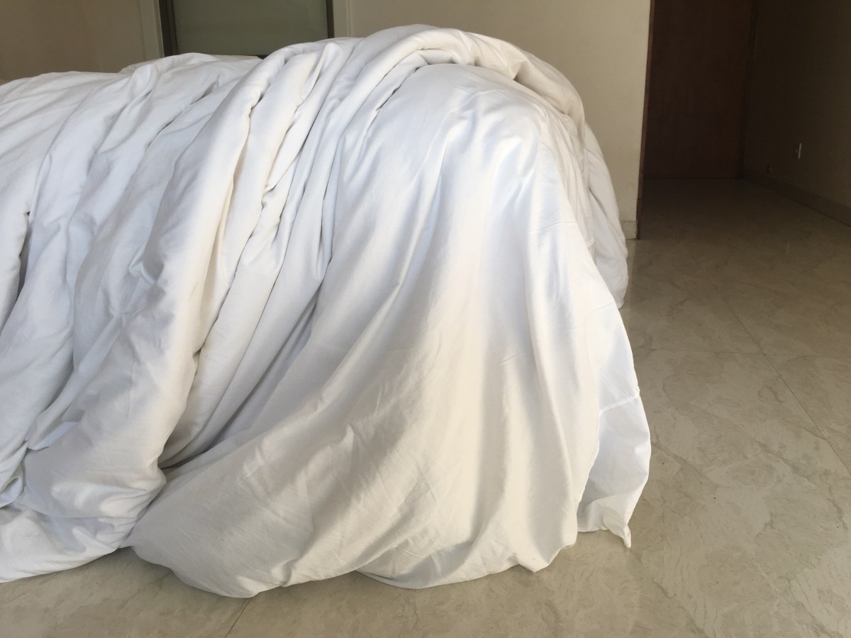 41b) Bettdecken-Gewurschtel